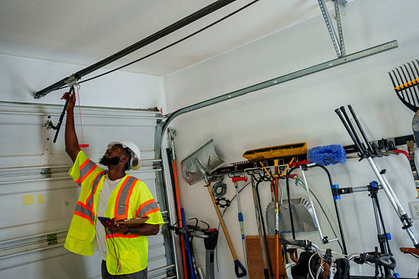 Professional Garage Door Panel Replacement technician working in Toledo, IA